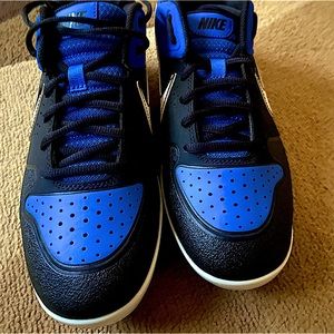 Blue and black Nike baseball cleats